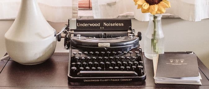Typewriter with a sunflower